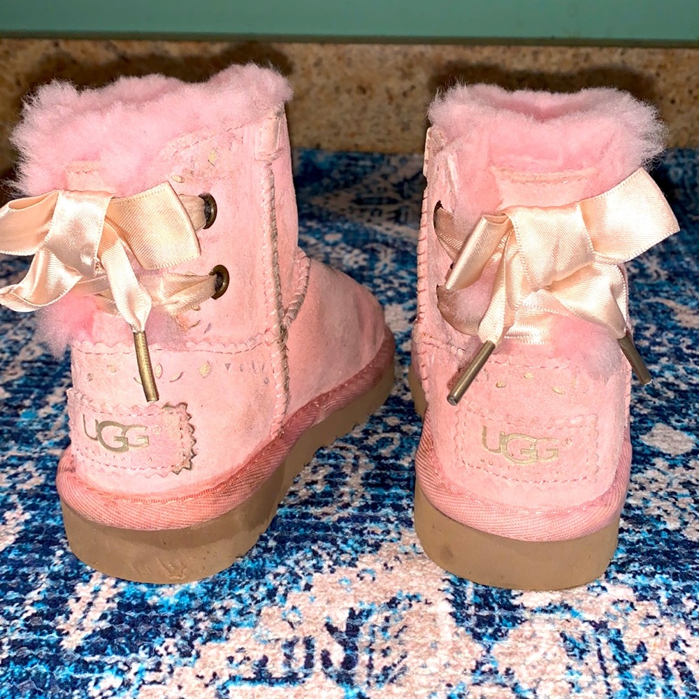 Toddler UGGS with a bow on the back